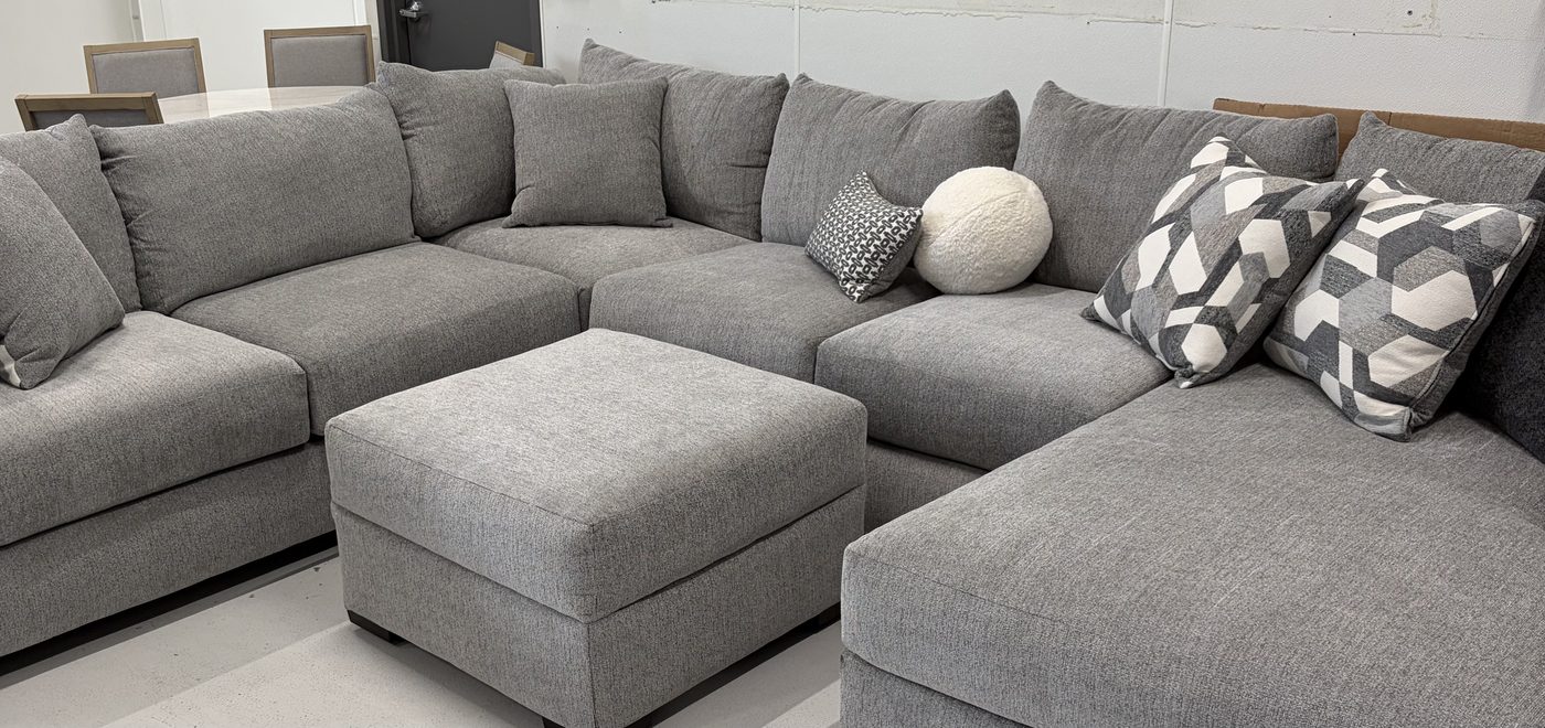 Gray sectional with ottoman in the BoxDrop Fond du Lac showroom